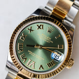 2023 Rolex Datejust 31 Green Dial Fluted Oyster Bracelet Two Tone YG