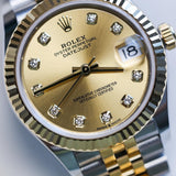 2024 Rolex Datejust 31 Champagne Dial Fluted Jubilee Two Tone YG 278273