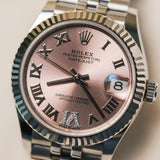 2023 Rolex Datejust 31 Pink Roman Numerals Diamonds Dial Fluted Jubilee